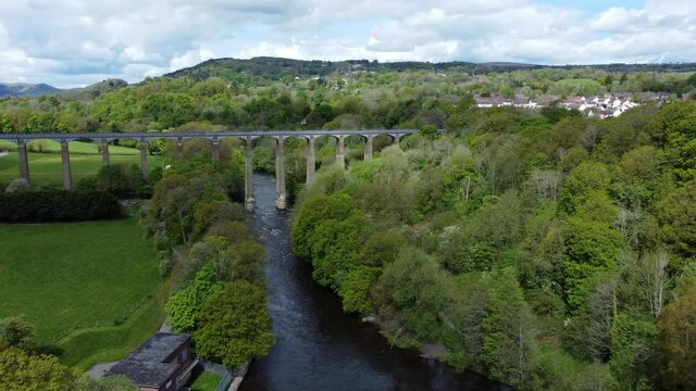 Aerial view Pontcysyllte aqueduct and River Dee canal narrow boat bride in Chirk Welsh valley countryside
