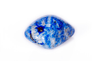 Macro mineral stone blue lapis lazuli (afghanistan) on white background