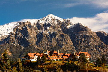 view from the lake of the llao llao hotel in bariloche