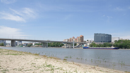View of the city from the left bank. On the Don River sailing ship