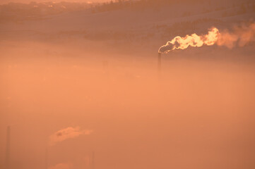 smoking pipe of coaling station in a small town