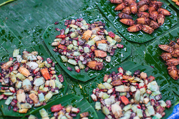 Raw insects, on banana leaf