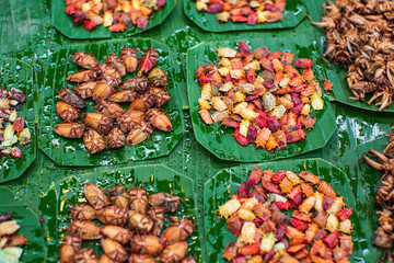 Raw insects, on banana leaf