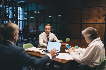 Business partners brainstorming while working in office