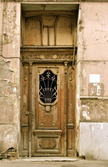 old wooden door in a wall, Tbilisi, Georgia