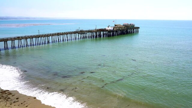 4k video. Capitola Pier, California coast, top view