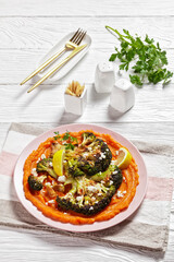 grilled broccoli steaks with puree and feta