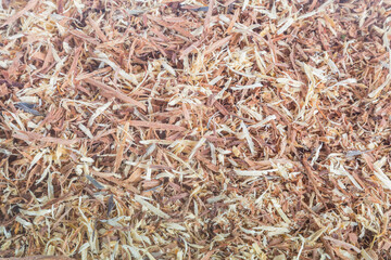 Sawdust brown from cutting wood by a carpenter.