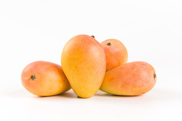 Ripe fresh mango fruit isolated on white background