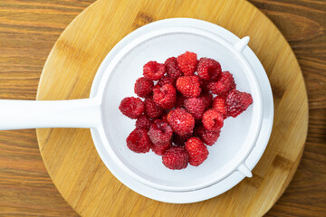 Fresh raspberries. A healthy meal addition to your diet.