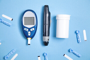 ..Glucometer with test strips and other objects. Devices for measuring of glucose in the blood