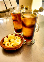 Glasses of vermouth on table in Spain