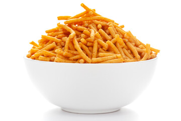 Close up of Nimbu masala besan sev Indian namkeen (snacks) on a ceramic white bowl.