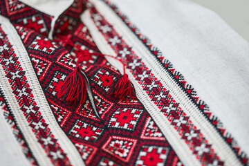 Ukrainian handmade vyshyvanka shirt embroidered with red and black threads. National clothing of...