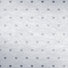 Silver leather background texture with heart pattern. Sparkle material backdrop