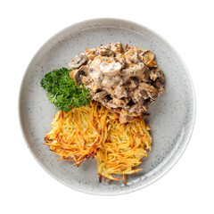 Isolated plate of potato pancakes with mushrooms and meat
