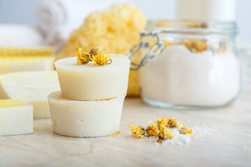 Solid shampoo bar many and handmade soap round bars with herbs dry marigold flowers. Spa bathroom...