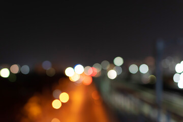 Abstract bokeh nightlight and blur car light bokeh on street background.