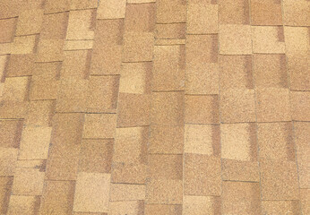 Closeup of the asphalt shingles roof on the top of the coffee cafe.