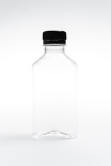 Empty bottle on white background