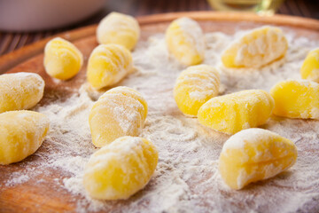 Homemade Gnocchi potato pasta on floured board