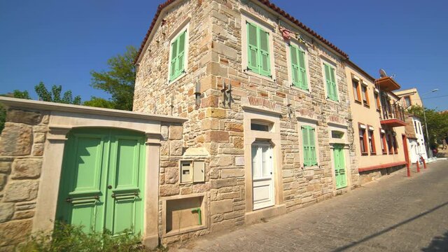 Classical traditional small street house architecture in Greece.Houses city town village side streets place housing little residence dwelling domestic tradition architectural settlement site Hellenic 