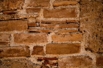 close-up of texture of stone block from shell rock with rough uneven masonry