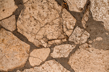 Close-up view of the floor surface of broken pieces of marble