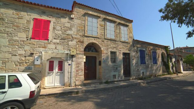Classical traditional small street house architecture in Greece.Houses city town village side streets place housing little residence dwelling domestic tradition architectural settlement site Hellenic 