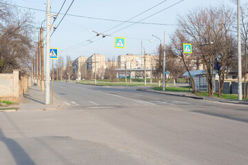 Fototapeta na wymiar empty pedestrian crossing and road signs road