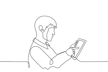 man pokes his finger into the screen of the tablet - one line drawing vector. profile portrait of a man using a touch gadget. viewing the news feed, internet surfin