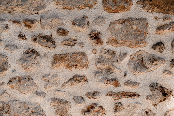 Close-up view at shell rock masonry of different shapes. Texture of natural stones.