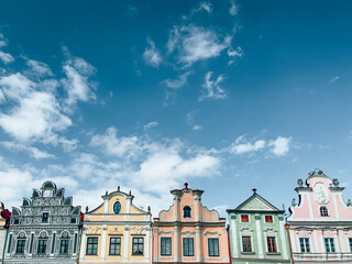 Fototapeta na wymiar Pastel colors of historic houses at the market square of Telc, Czech