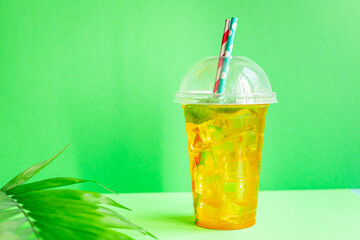 summer background lemonade refreshing cold ice drink, straw hat, sunglasses relax positive mood vacation top view