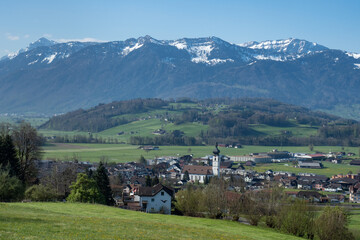 View of the village of Kaltbrunn, Switzerland, with surrounding fields and hills