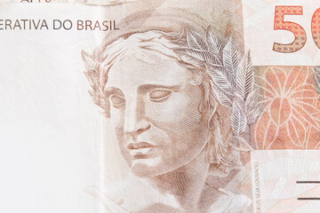 Brazilian currency real money bank notes with coins
