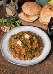 Indian pav bhaji mix vegetables with buttered bun