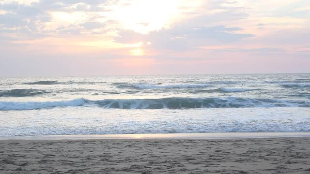 Afternoon sunshine on the sea at the sandy beach