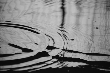 Peaceful black and white sea water abstract monochromatic background with beautiful light and shadow composition