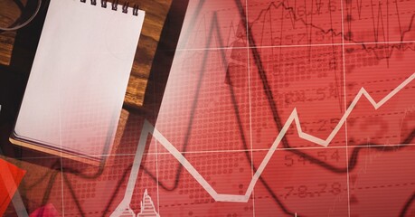 Composition of financial statistics processing and notepad in background
