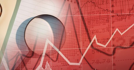 Composition of financial statistics processing and magnifying glass in background