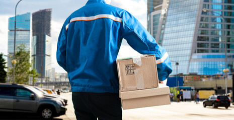 courier in the city carrying the cargo box. deliver the package