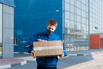 courier in the city carrying the cargo box. deliver the package