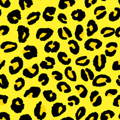 Abstract modern leopard seamless pattern. Animals trendy background. Black and yellow decorative vector illustration for print, card, postcard, fabric, textile. Modern ornament of stylized skin