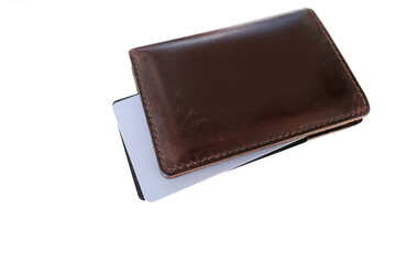 close-up of payment credit cards in a stack in a leather wallet on a white table, the concept of electronic payment, payments from bank funds, credit history, business
