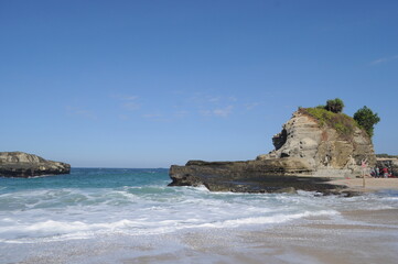 Beautiful scenery of extreme waves with blue skies on Klayar Beach, Pacitan Indonesia