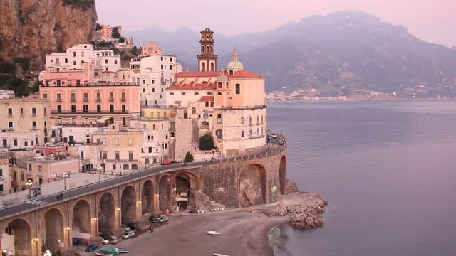 Scenic view at Atrani town between mountains and sea at dusk, Amalfi coast.  It's a smallest municipality in Italy and is one of Italy&rsquo;s undiscovered best-kept secrets. 