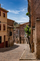 Fototapeta na wymiar Deserted street in the medieval village Daroca in Aragon. 