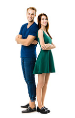 Smiling attractive couple. Full body length portrait of standing back to back models at happy in love studio concept, isolated over white background. Man and woman posing together.