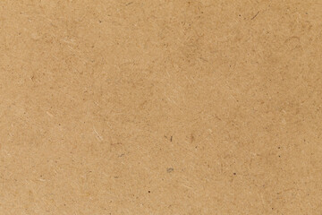 Pressed beige chipboard texture.